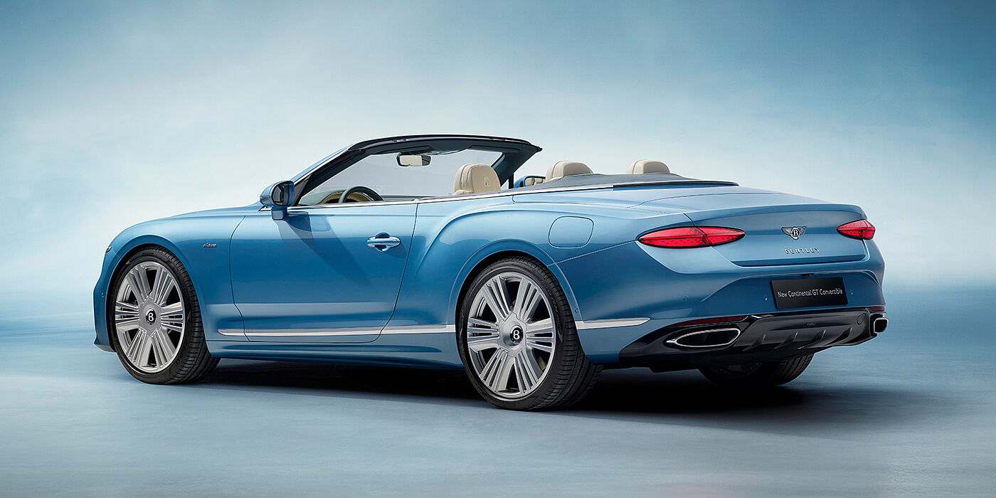 Bentley Panama New Bentley Continental GTC Azure convertible rear view in Light Windsor blue paint with 22 inch ten spoke wheels and chrome exterior details