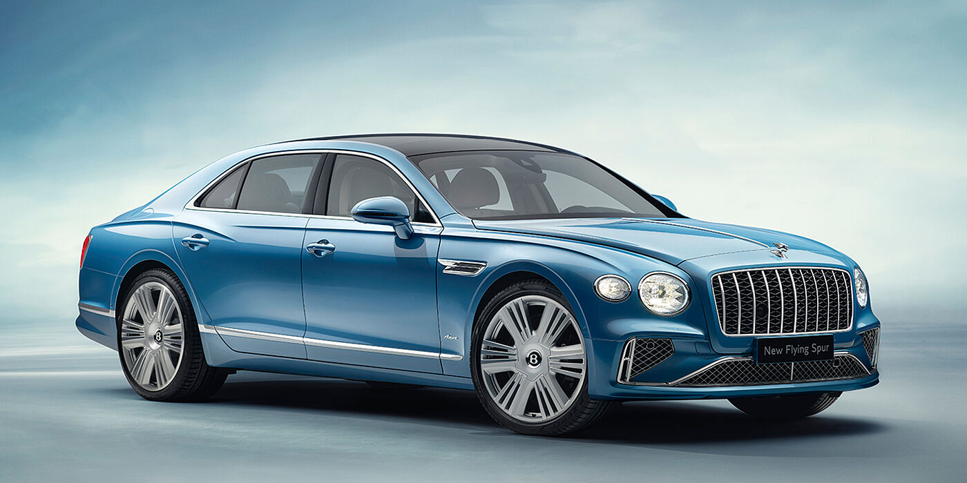 Bentley Panama New Bentley Flying Spur Azure sedan front view in Light windsor blue by Mulliner paint with 22 inch Azure wheels and chrome exterior details