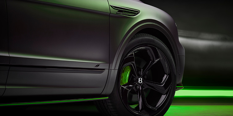 Bentley Panama Bentley Bentayga S Black Edition SUV exterior wheel detail with Cyber Green brakes with Anthracite Satin paint